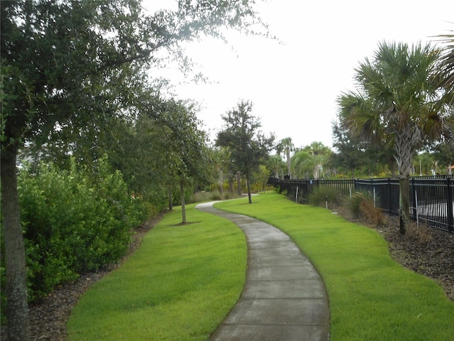 surrounding community featuring a lawn