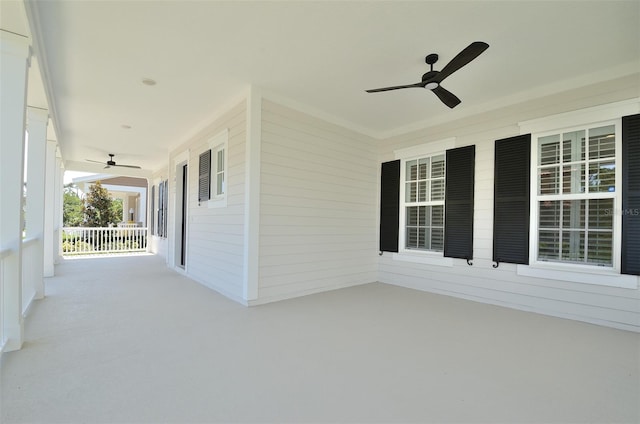 view of patio featuring ceiling fan