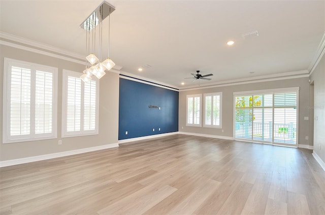 unfurnished living room with ceiling fan, light hardwood / wood-style floors, and ornamental molding