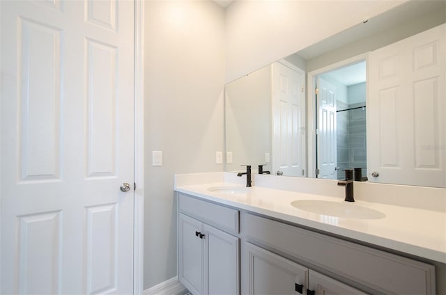 bathroom featuring vanity and walk in shower