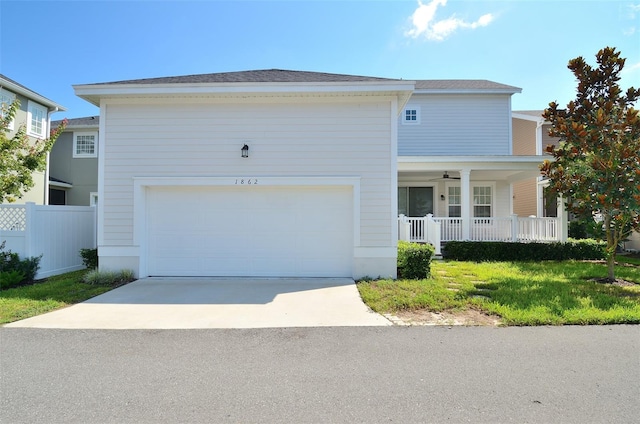 view of front facade with a garage and a porch