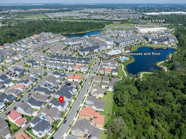 drone / aerial view with a water view