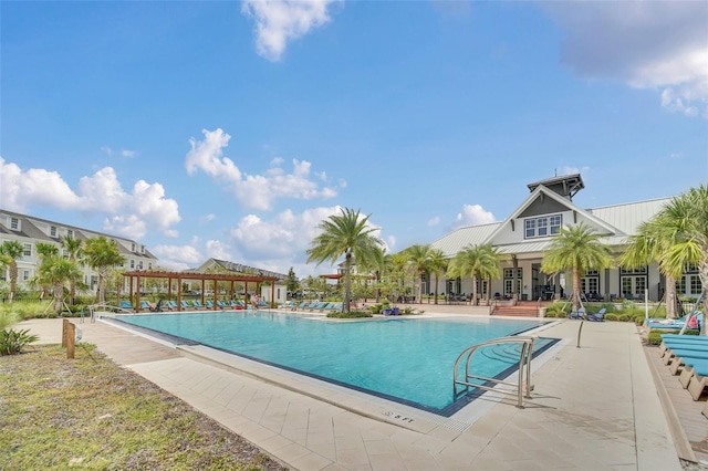 view of swimming pool featuring a patio area