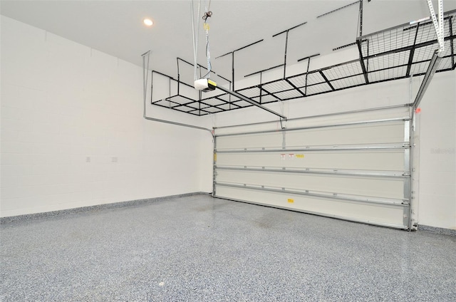 1862 Beach Ridge Rd, Celebration, FL 34747 - garage with baseboards, a garage door opener, and recessed lighting