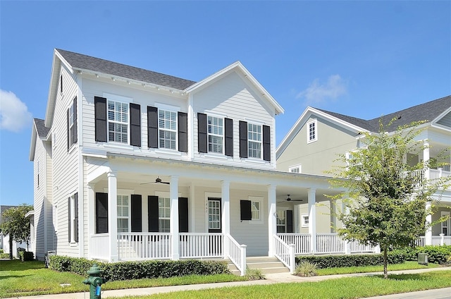 1862 Beach Ridge Rd, Celebration, FL 34747 - view of front of house with covered porch and a ceiling fan