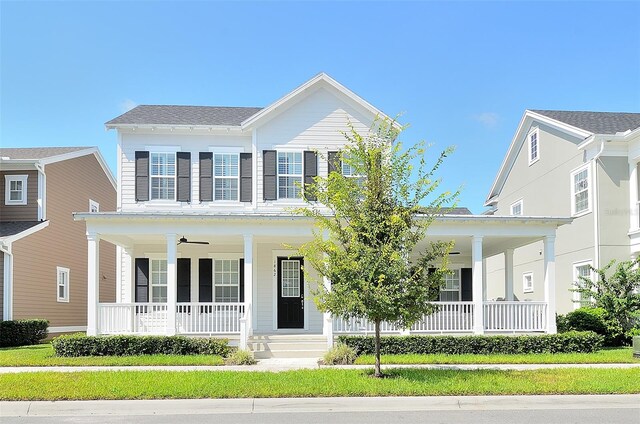 1862 Beach Ridge Rd, Celebration, FL 34747 - view of front of home featuring a porch