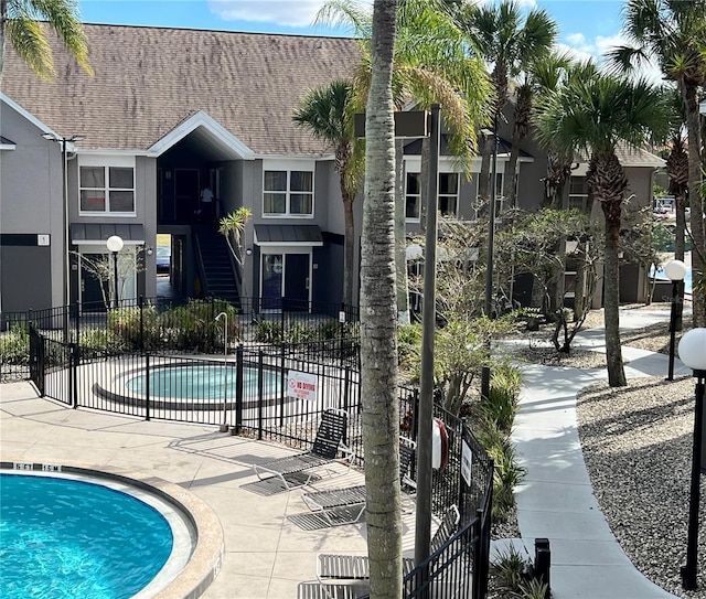 view of swimming pool with a patio