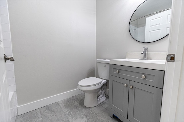 full bathroom featuring tile patterned floors, toilet, shower / washtub combination, and vanity