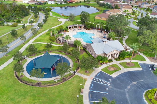 birds eye view of property with a water view