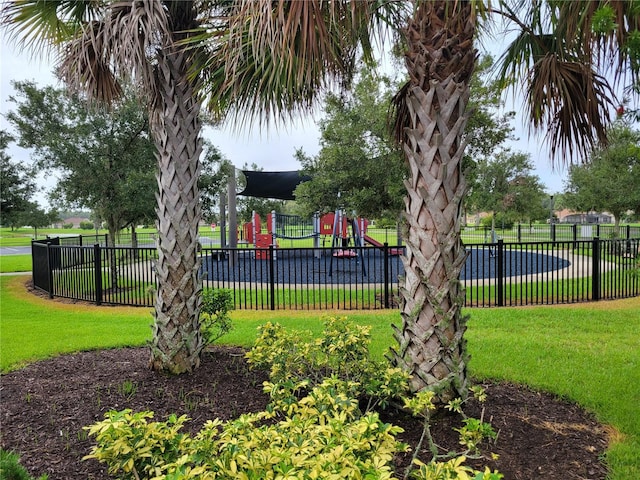 view of playground with a yard