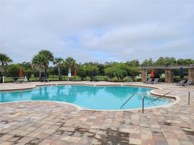 view of pool featuring a patio area