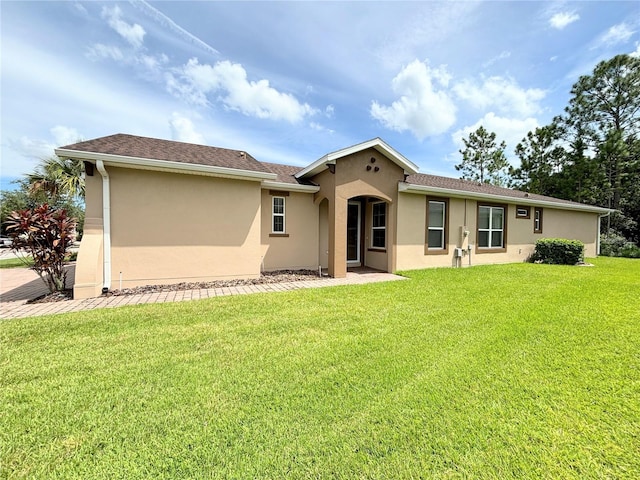 view of front of house with a front yard