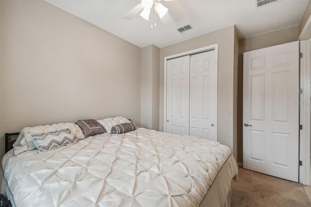 bedroom featuring carpet flooring, ceiling fan, and a closet