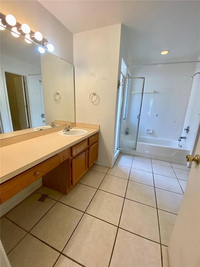 bathroom with tile patterned floors and vanity