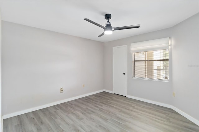 unfurnished room with light hardwood / wood-style flooring and ceiling fan