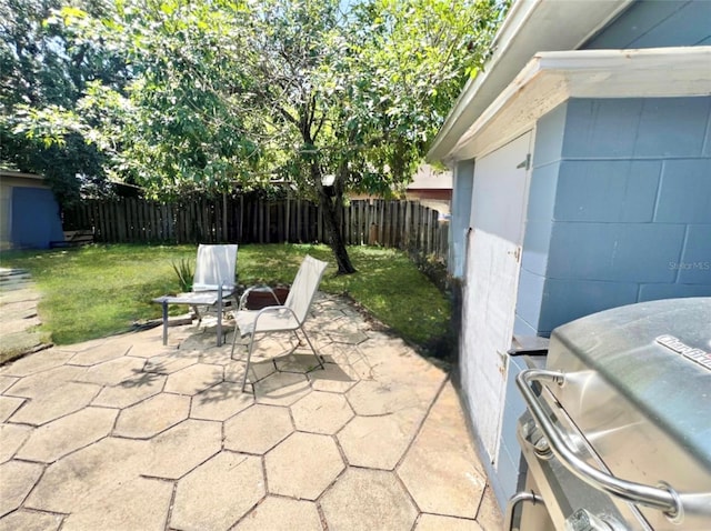 view of patio with a grill