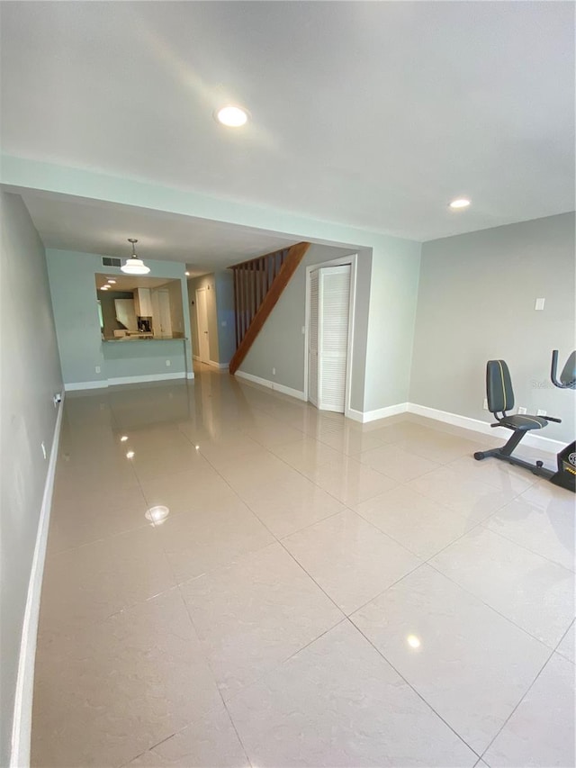 interior space featuring light tile patterned flooring