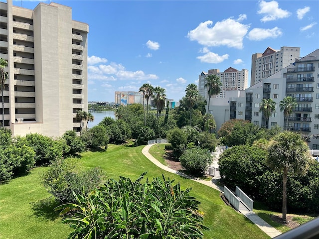 view of home's community with a lawn