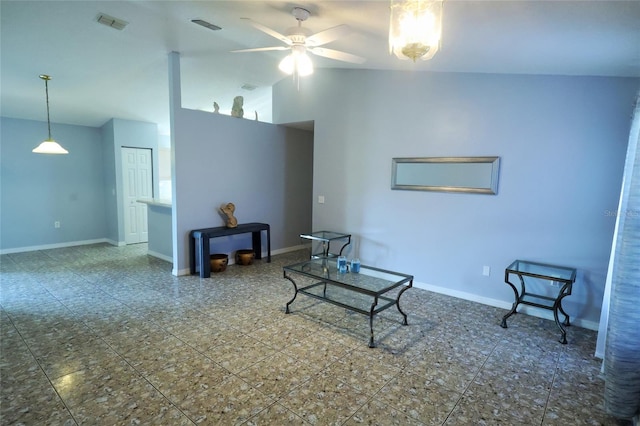 living area with ceiling fan, tile patterned flooring, and high vaulted ceiling