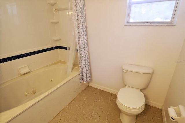 bathroom featuring shower / bath combo, toilet, and tile patterned floors