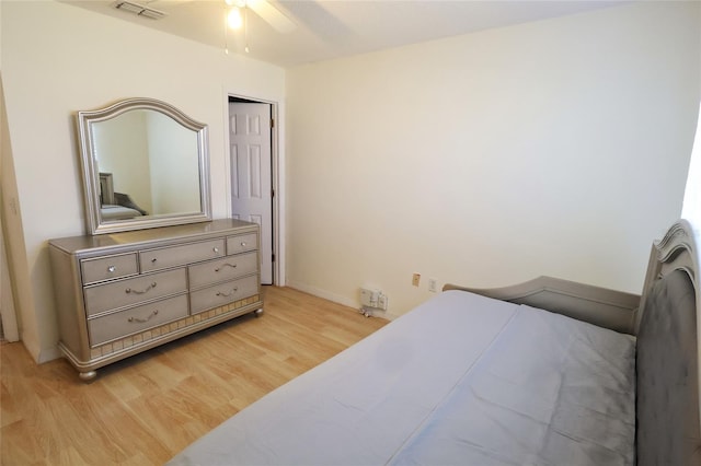 bedroom featuring light hardwood / wood-style flooring and ceiling fan