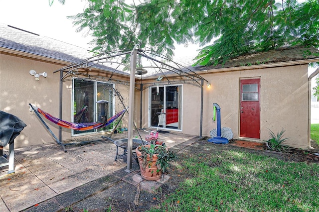 rear view of property with a patio area