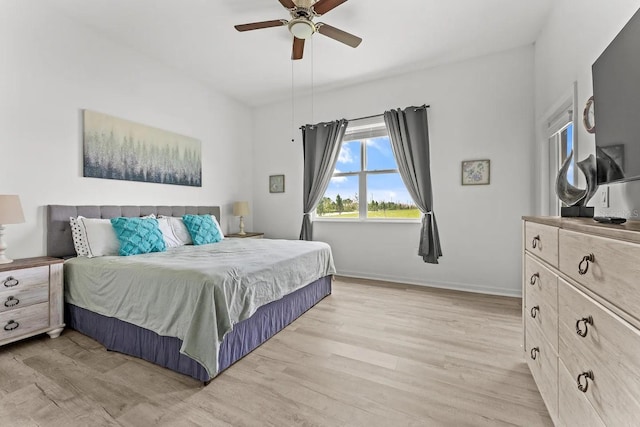 bedroom featuring ceiling fan and light wood-type flooring