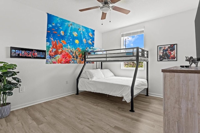 bedroom featuring ceiling fan and wood-type flooring