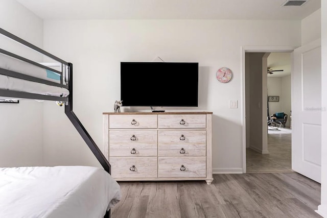 bedroom with light hardwood / wood-style floors