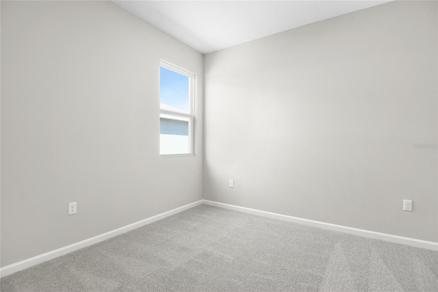 empty room with carpet flooring