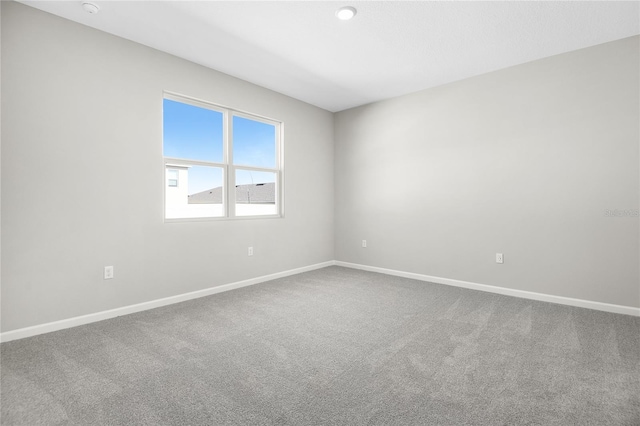 empty room featuring carpet floors