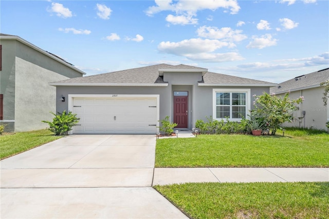 view of front of home with stucco siding, a shingled roof, an attached garage, a front yard, and driveway