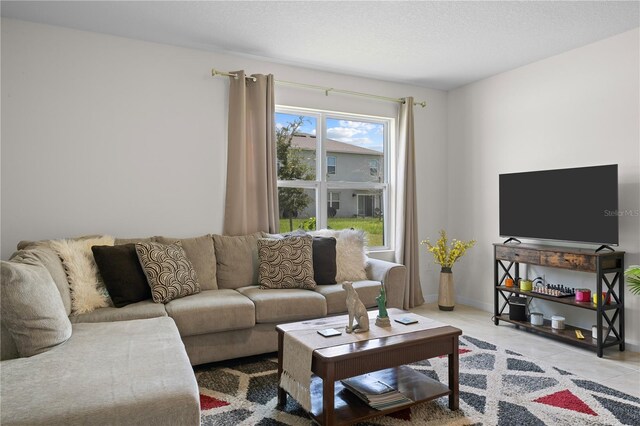 living room featuring light tile patterned floors