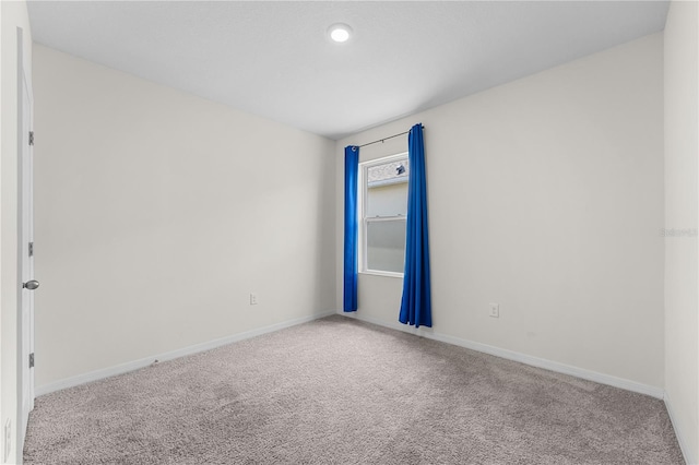 unfurnished room with carpet