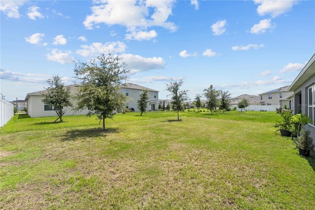 view of yard featuring a residential view