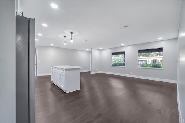 spare room featuring dark hardwood / wood-style floors