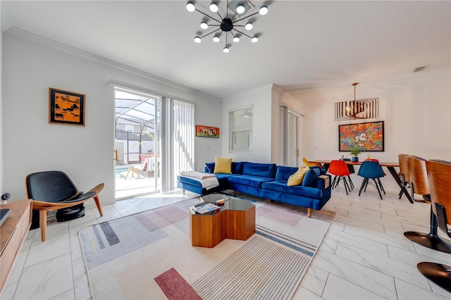 living area with a textured ceiling, marble finish floor, visible vents, and an inviting chandelier