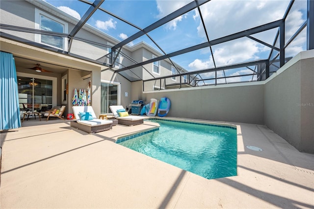 pool with a patio and a lanai