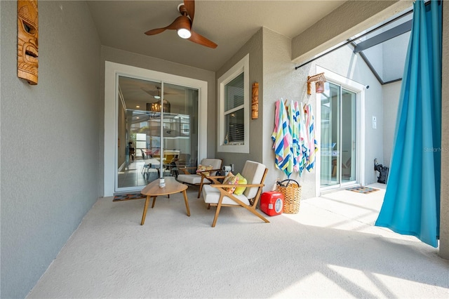 view of patio / terrace featuring ceiling fan