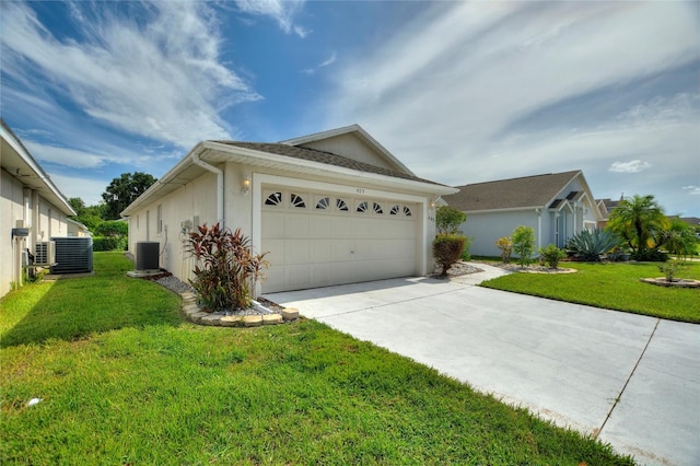 ranch-style house with central AC, a garage, and a front yard