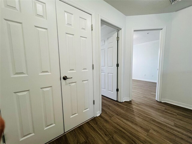 interior space featuring dark wood-type flooring