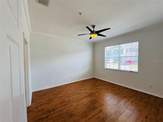 unfurnished room with ceiling fan, ornamental molding, and dark hardwood / wood-style floors