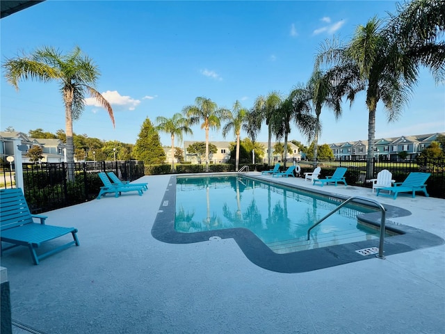 view of swimming pool featuring a patio area