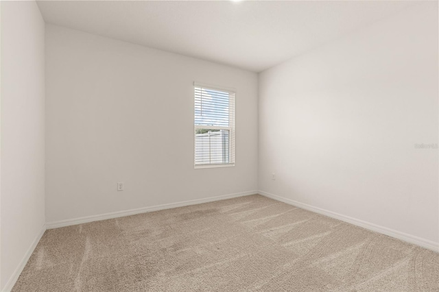 empty room with carpet flooring