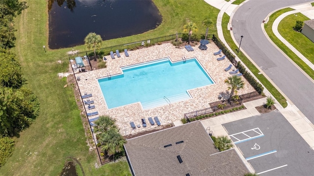 birds eye view of property featuring a water view