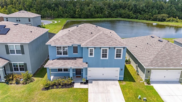 birds eye view of property featuring a water view