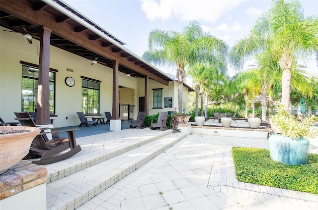 view of patio / terrace featuring ceiling fan