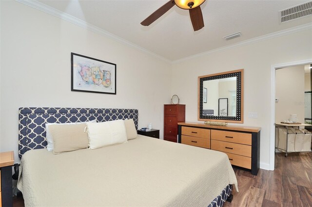 bedroom featuring dark hardwood / wood-style flooring, ornamental molding, and ceiling fan