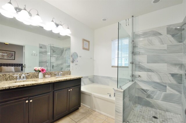 bathroom featuring vanity, separate shower and tub, and tile patterned flooring