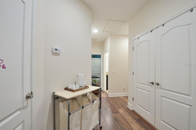 hallway with dark wood-type flooring